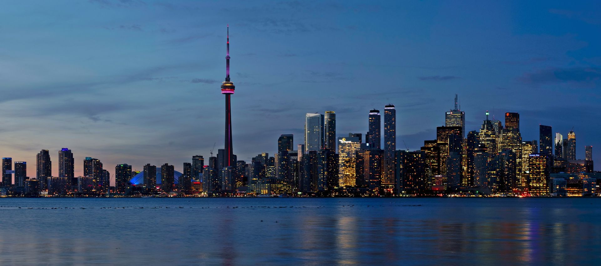 Toronto skyline and CN Tower at dusk